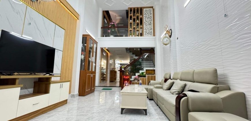 Thiết kế phòng khách hiện đại tặng kèm full nội thất cao cấp tiền tỷ tại nhà Nguyễn Duy Cung Gò Vấp.