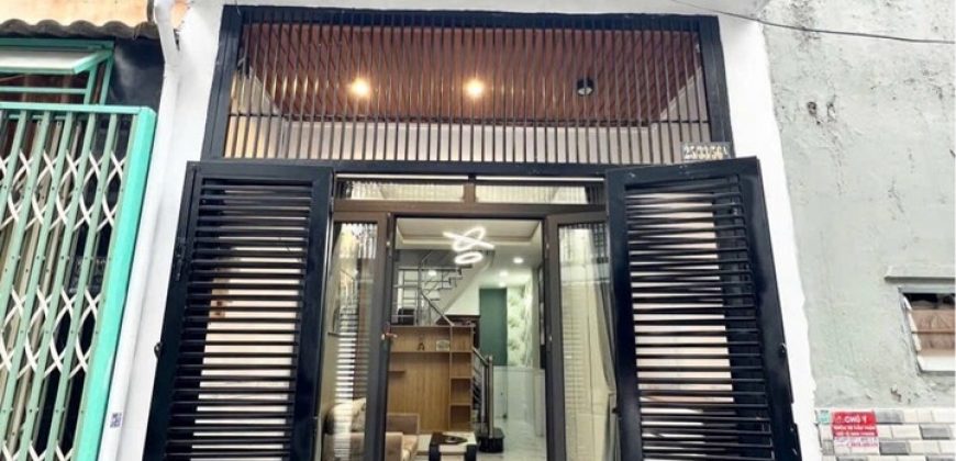 Hình ảnh thực tế mặt tiền nhà Gò Vấp dưới 5 tỷ tại hẻm Bùi Quang Là Phường 12 thông thoáng, khu dân cư hiện hữu sầm uất.