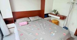 Không gian phòng ngủ lầu 1 căn nhà đường Huỳnh Văn Nghệ Gò Vấp có cửa sổ thoáng mát
