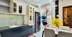 Phòng khách rộng rãi, nội thất cao cấp, không gian mở và thoáng sáng tại căn nhà bán Phạm Văn Chiêu Gò Vấp.