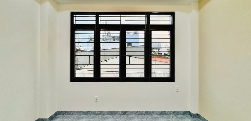 Không gian phòng ngủ ấm cúng ngập tràn ánh sáng tại nhà Gò Vấp Phường 17