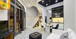 Phòng khách nhà Gò Vấp đường Thống Nhất Phường 15 thiết kế hiện đại, không gian rộng rãi.