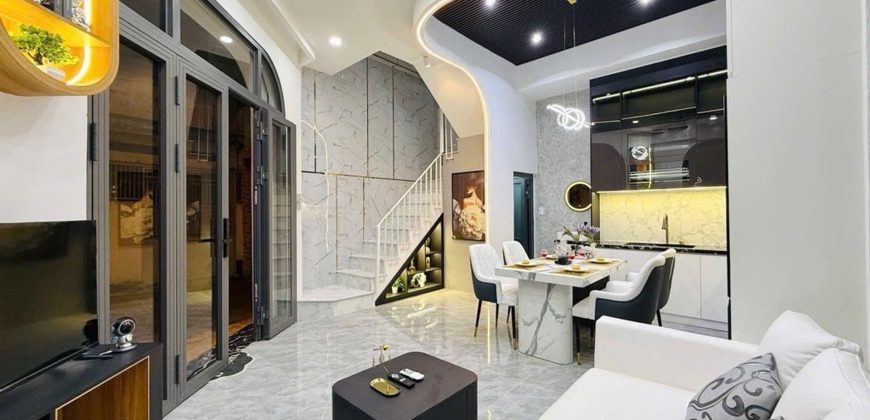 Phòng khách nhà Gò Vấp đường Thống Nhất Phường 15 thiết kế hiện đại, không gian rộng rãi.