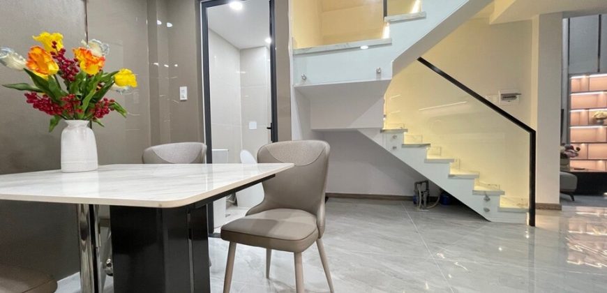 Nội thất phòng ngủ nhà Gò Vấp Phường 14 Quận Gò Vấp bố trí gọn gàng và tiện nghi