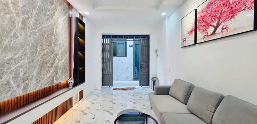 Không gian phòng khách nhà Gò Vấp Phường 11 thiết kế hiện đại rỗng rãi