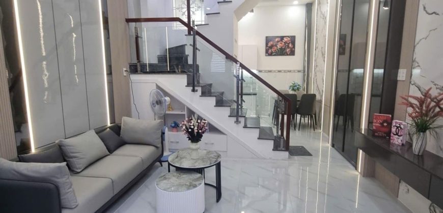 Phòng khách nhà phố Gò Vấp diện tích 32m2 đường Thống Nhất rộng rãi