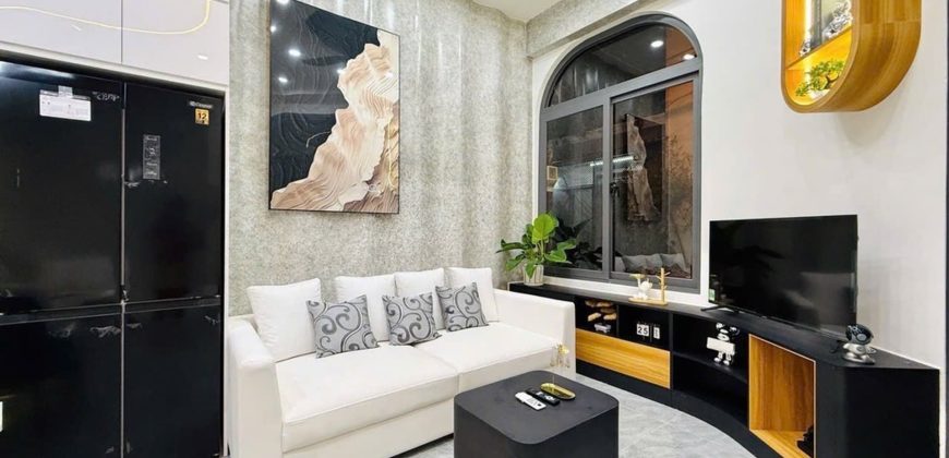 Phòng khách nhà phố Gò Vấp hẻm xe hơi đường Thống Nhất, Phường 15 sáng và thoáng,tiếp khách rộng rãi